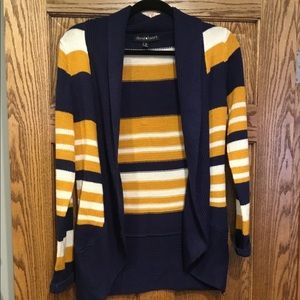 Nice navy, white, yellow/mustard sweater. In excellent condition!